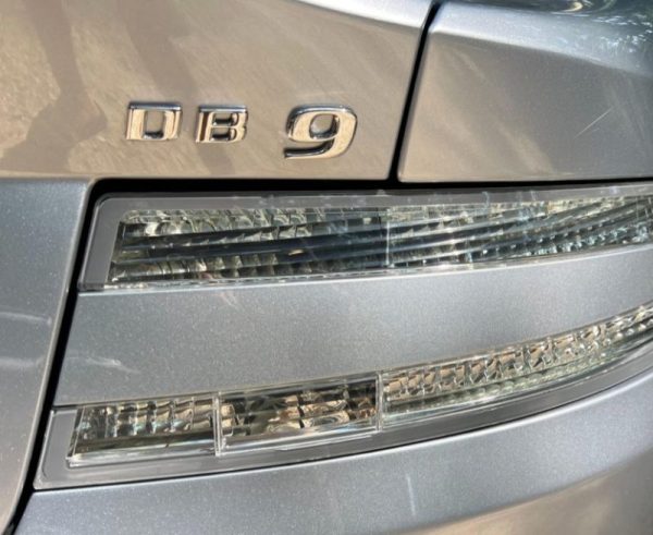 GENUINE OEM CG43-001B40-AA ASTON MARTIN DB9 BADGE DB9, BOOT EMBLEM NEW