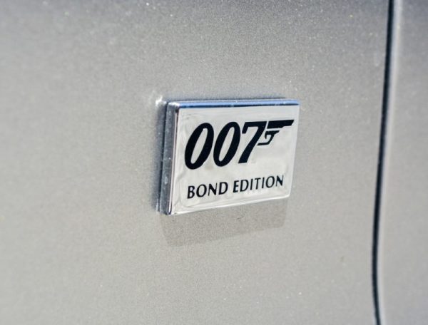 GENUINE OEM GG43-43548-AA ASTON MARTIN DB9 BADGE, BOND EDITION EMBLEM NEW