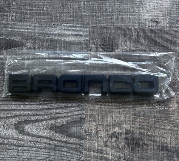 Genuine OEM NOS 1987 1988 1989 1990 1991 FORD BRONCO FRONT FENDER EMBLEM IN MATTE BLACK E7TZ16720