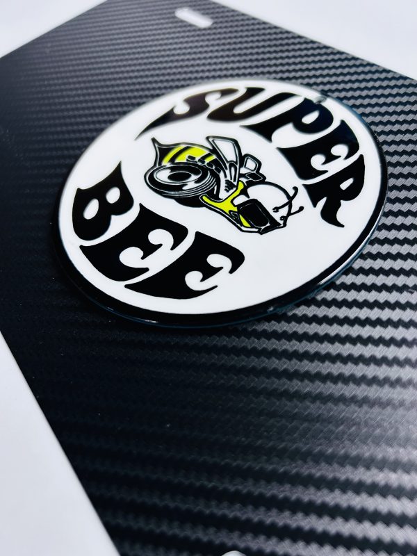 OEM 3D Dodge Mopar Dodge Super Bee Carbon Fiber License Plate New (1)PC Licensed Product Thin Aluminum Rare! Fits Challenger / Charger / SRT8 / RT / 392 / Jeep / RAM / Magnum / 300c